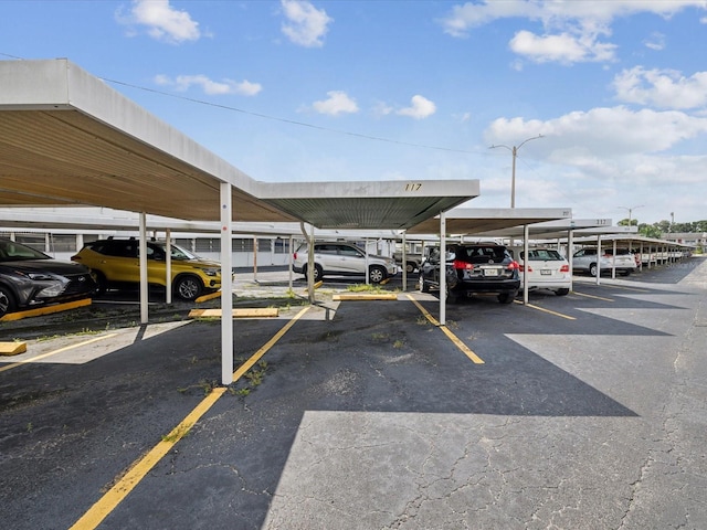 view of parking with a carport