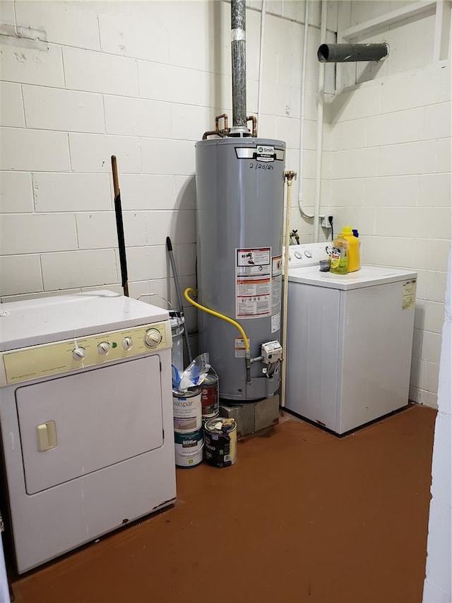 utility room with independent washer and dryer and gas water heater