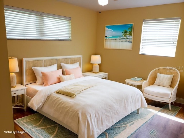 bedroom featuring hardwood / wood-style flooring