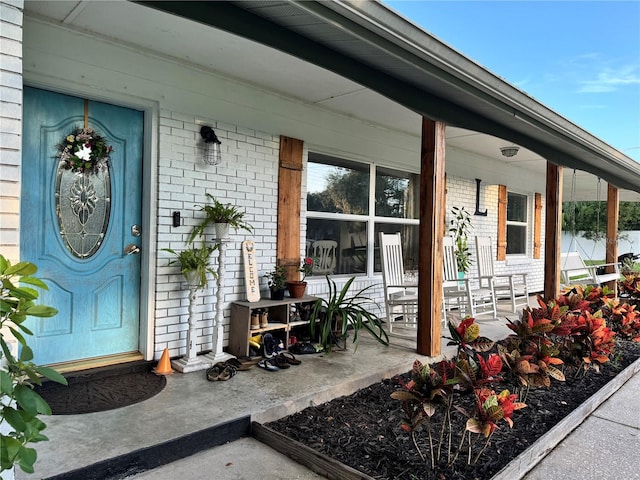 entrance to property with covered porch