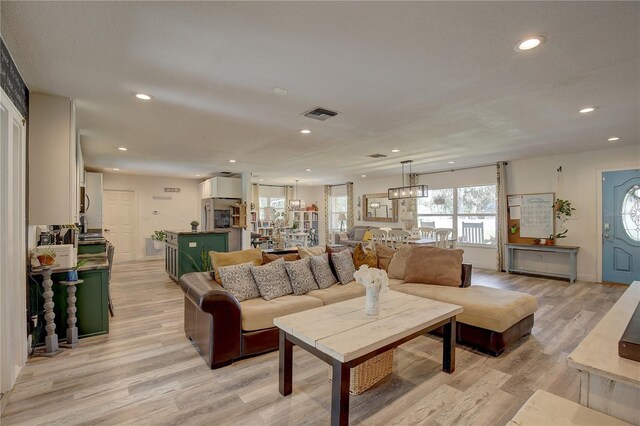 living room featuring light hardwood / wood-style floors