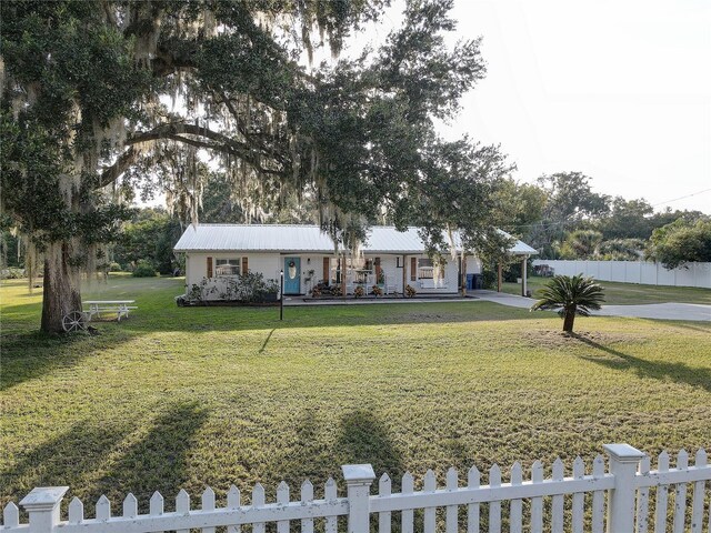 view of front of home with a front yard