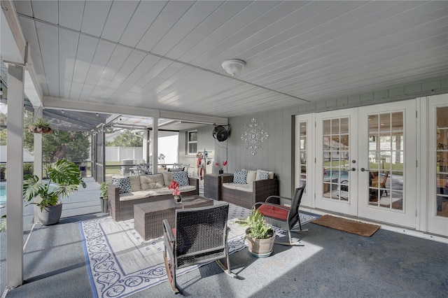 7809 Alafia Dr, Riverview, FL 33578 - sunroom with french doors and outdoor lounge area