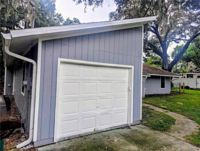 garage with a lawn