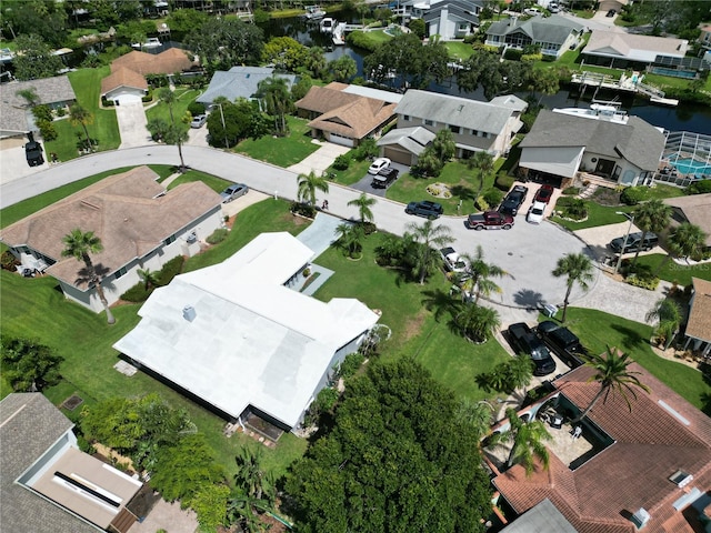 drone / aerial view with a water view