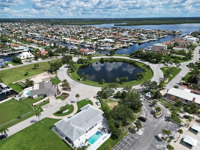 drone / aerial view with a water view