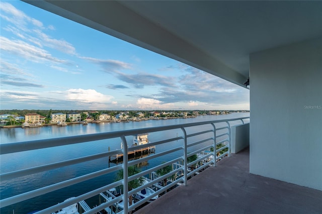 balcony featuring a water view