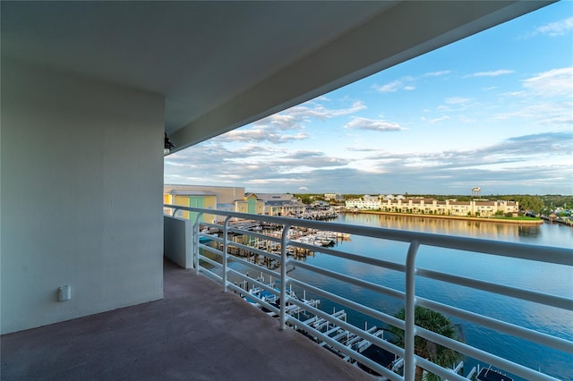 balcony featuring a water view