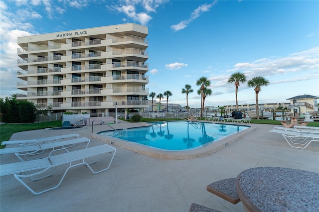 view of swimming pool featuring a patio