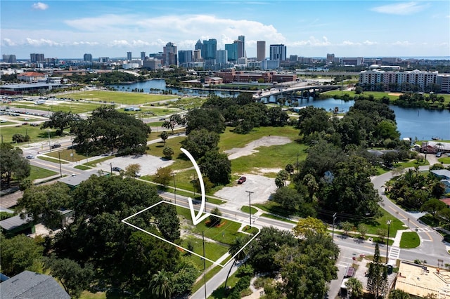 drone / aerial view with a water view and a city view