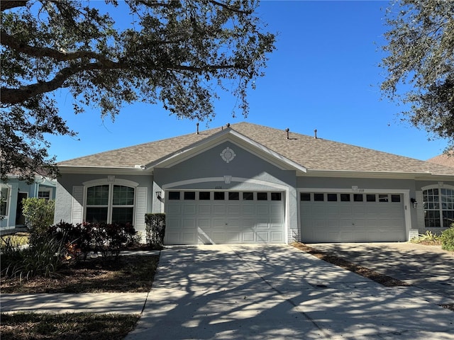 single story home with a garage