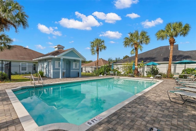 view of pool featuring a patio