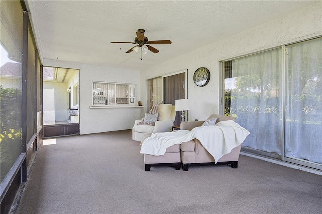 sunroom / solarium with ceiling fan