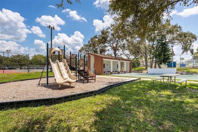 view of play area featuring a yard