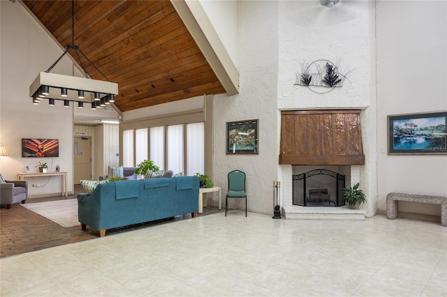 tiled living room featuring high vaulted ceiling, wooden ceiling, and a brick fireplace