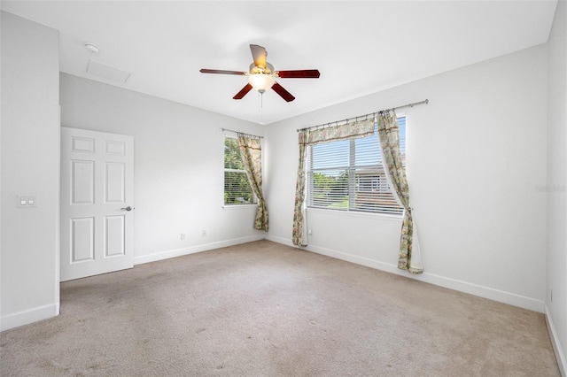 1008 Blue Heron Way, Tarpon Springs, FL 34689 - unfurnished room featuring ceiling fan, baseboards, and carpet floors