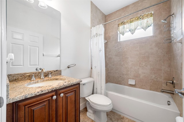 bathroom with shower / bath combo, vanity, and toilet