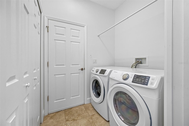 laundry area featuring laundry area and washing machine and clothes dryer