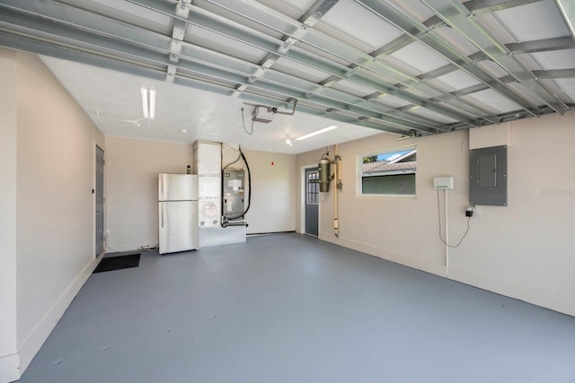 garage featuring a garage door opener, water heater, freestanding refrigerator, electric panel, and baseboards