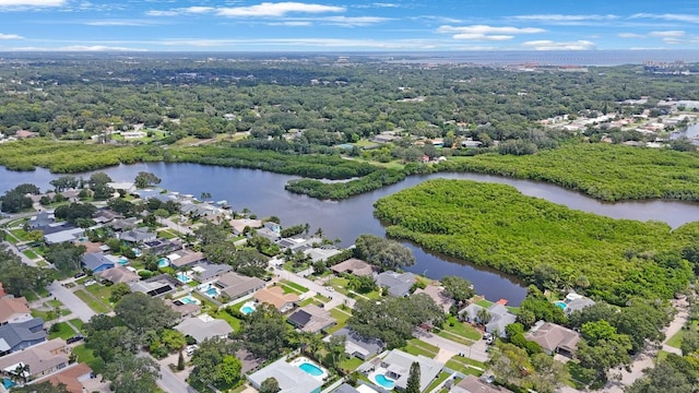 bird's eye view with a residential view and a water view