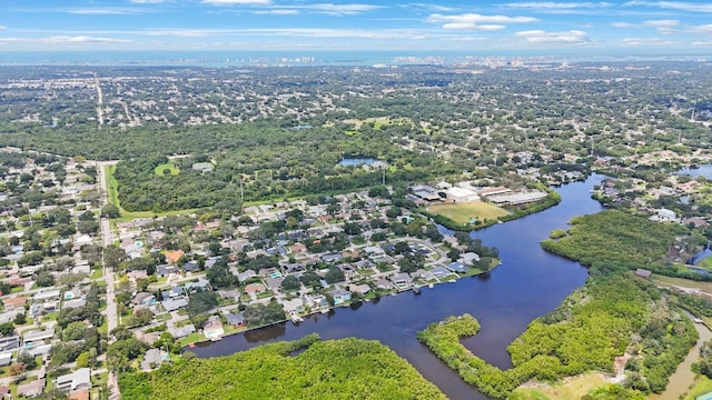 birds eye view of property featuring a water view and a residential view