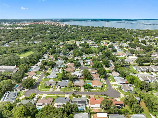 aerial view with a residential view and a water view