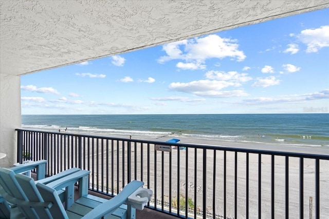 14300 Gulf Blvd Unit 206, Madeira Beach, FL 33708 - balcony featuring a beach view and a water view