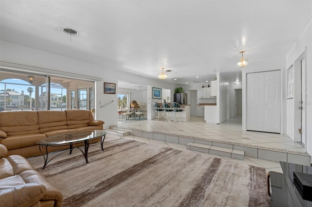 living room featuring light tile patterned floors