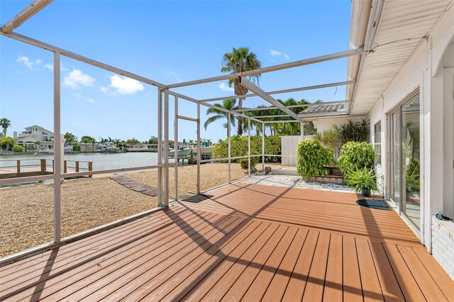 wooden deck with a water view