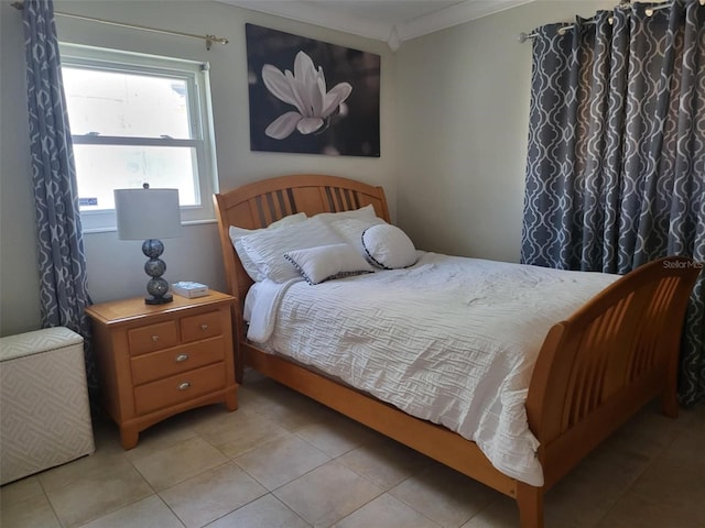 tiled bedroom featuring crown molding