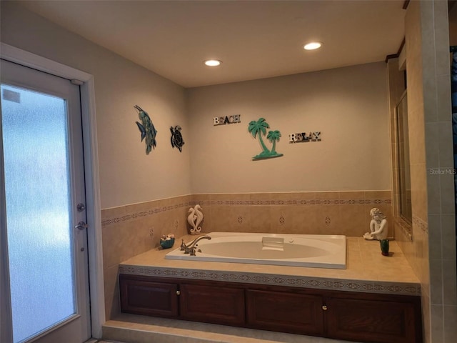3912 Fontainebleau Dr, Tampa, FL 33634 - bathroom with recessed lighting and a bath