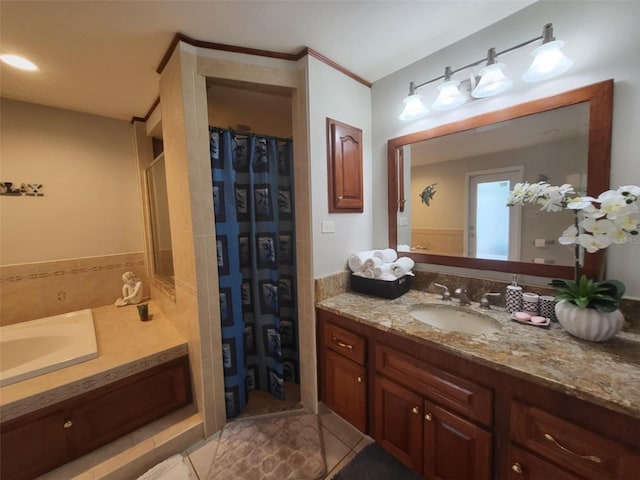 bathroom featuring tile patterned flooring and vanity