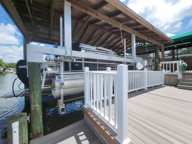 dock area with a water view