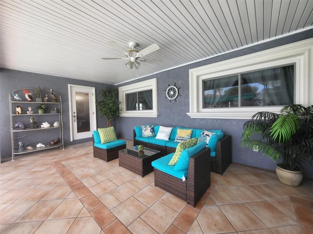 view of patio with ceiling fan and outdoor lounge area