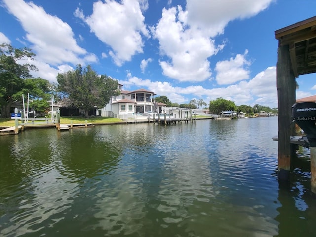 view of water feature with a dock