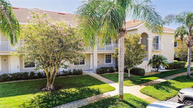 view of front of property with a front lawn