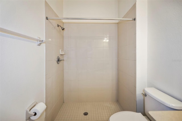 full bath with toilet and a shower stall