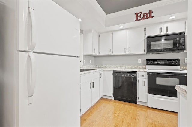 kitchen with black appliances, white cabinetry, light hardwood / wood-style flooring, and ornamental molding