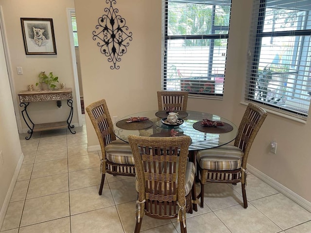 dining space with light tile patterned floors