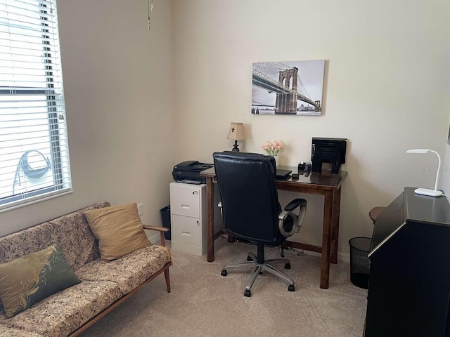 office area with a healthy amount of sunlight and carpet