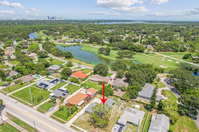 drone / aerial view with a water view