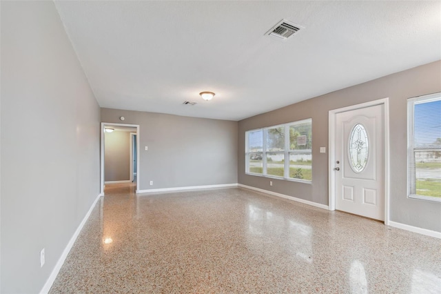 entrance foyer featuring a textured ceiling