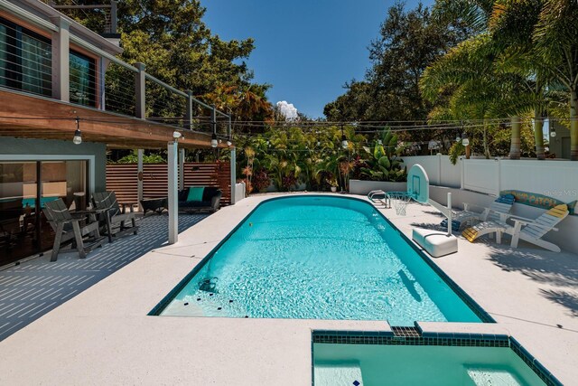 view of pool featuring a patio