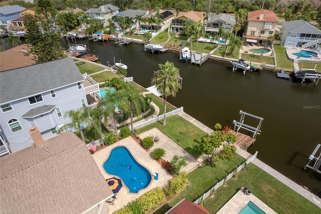 birds eye view of property featuring a water view