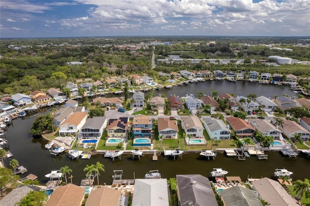 aerial view featuring a residential view and a water view