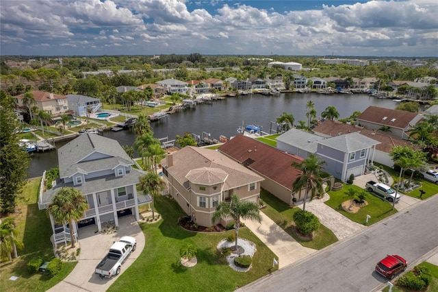 aerial view with a water view and a residential view