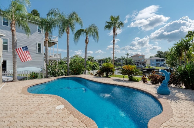 outdoor pool featuring a patio