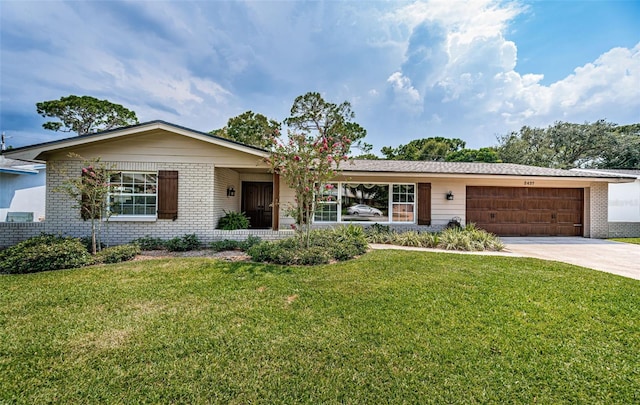 ranch-style house with a front yard and a garage