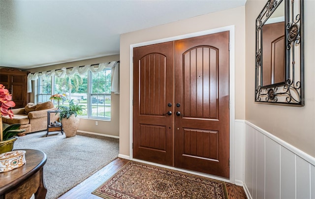 foyer entrance featuring wood-type flooring