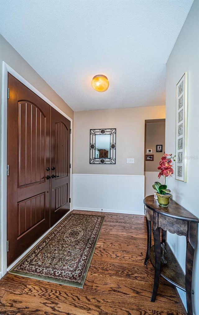 entrance foyer featuring hardwood / wood-style floors